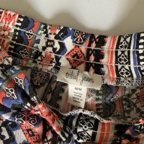 Tribal Jeans. Boho pants with slits at ankle and tassel at waist line. - Picture 3 of 4